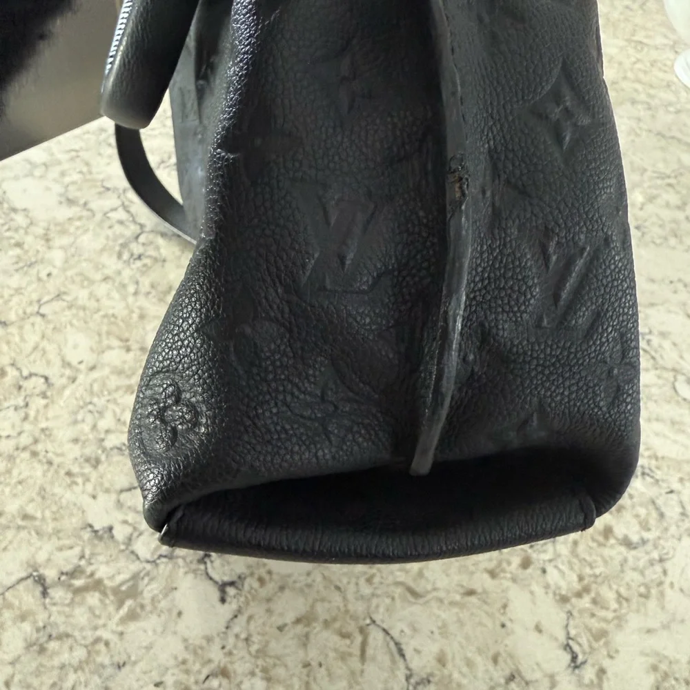 Louis Vuitton Black Monogram Bag with Gold Accents - Picture 11 of 12